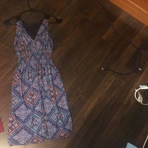 Purple patterned sleeveless dress knee length